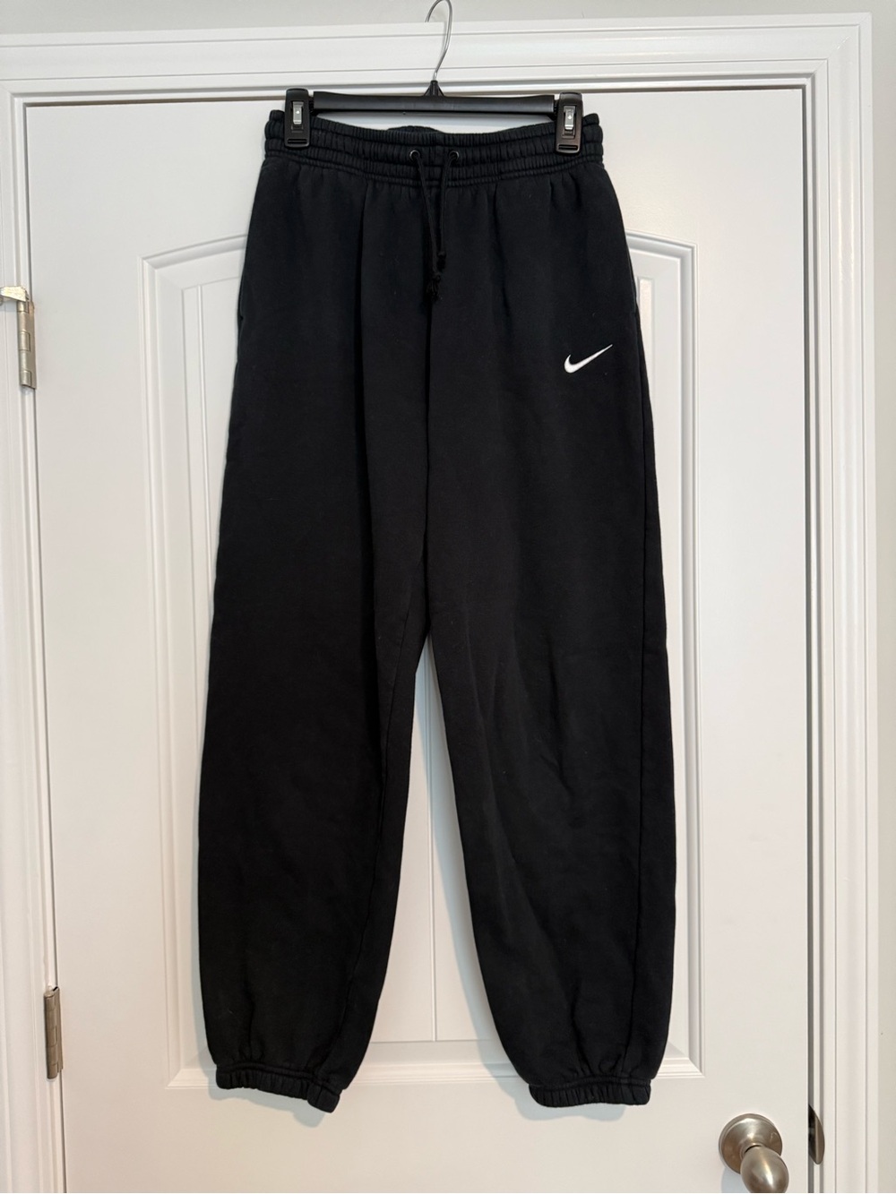 Nike Black Sweatpants with White Swoosh Logo